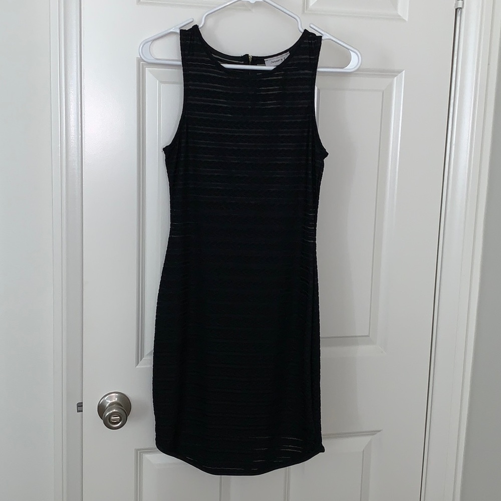 Mini black dress. Size 7 .